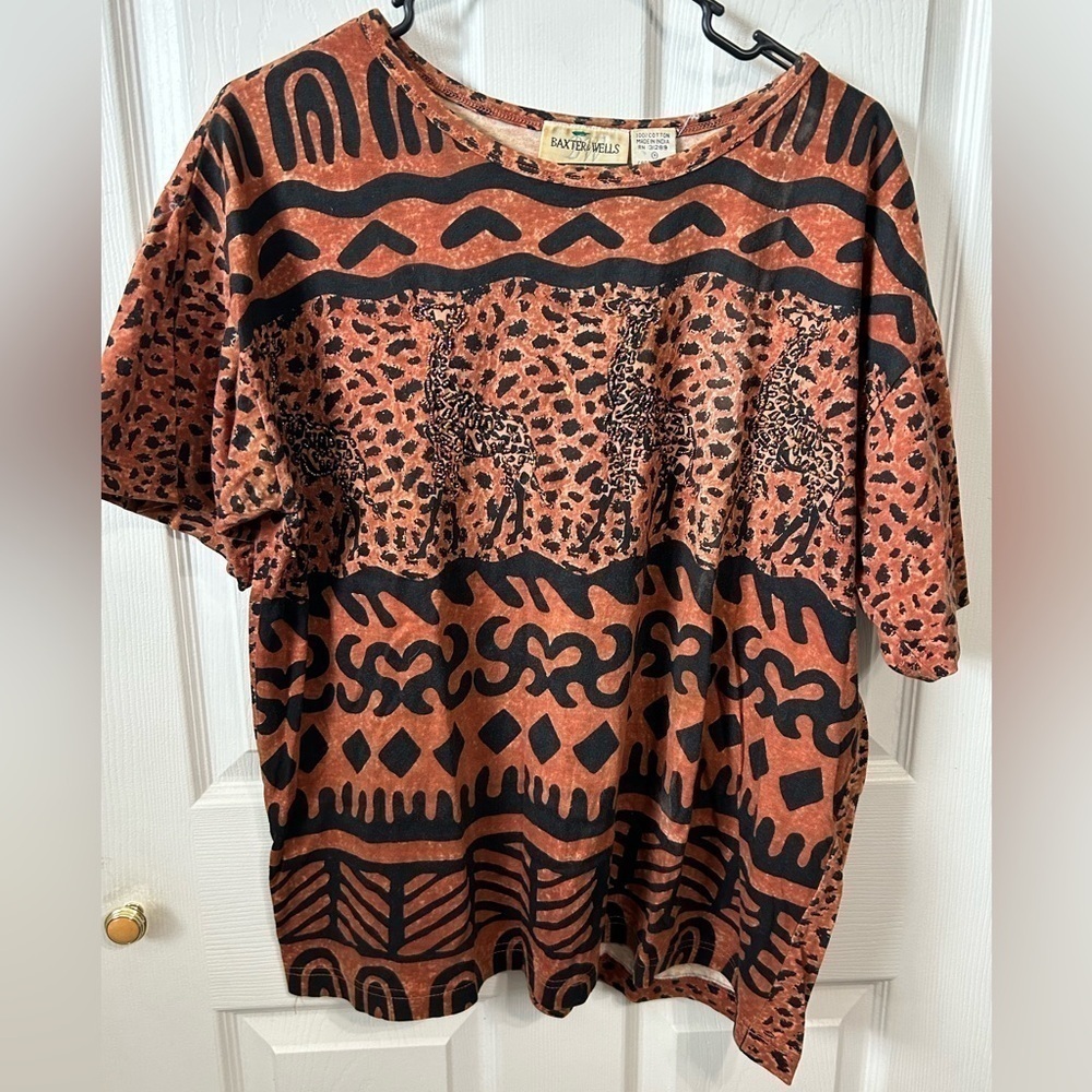 Baxter & wells top. Tribal, animal print. Beaded. Size M